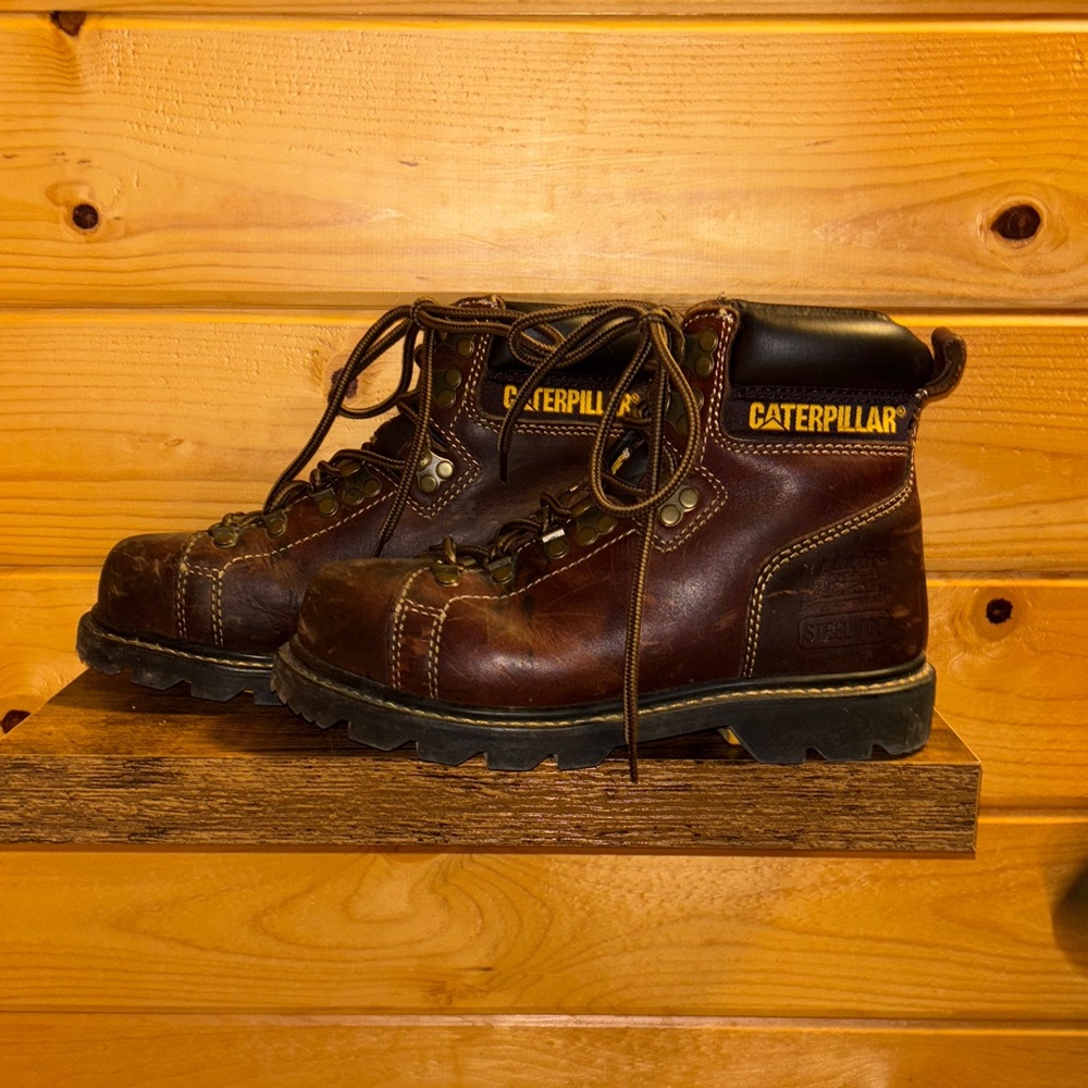 Caterpillar steel toe work boots.
 Dark Brown Leather Boots